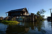 Inle Lake Myanmar. All the buildings are constructed on piles. Residents travel around by canoe, but there are also bamboo walkways and bridges over the canals, monasteries and stupas. 
